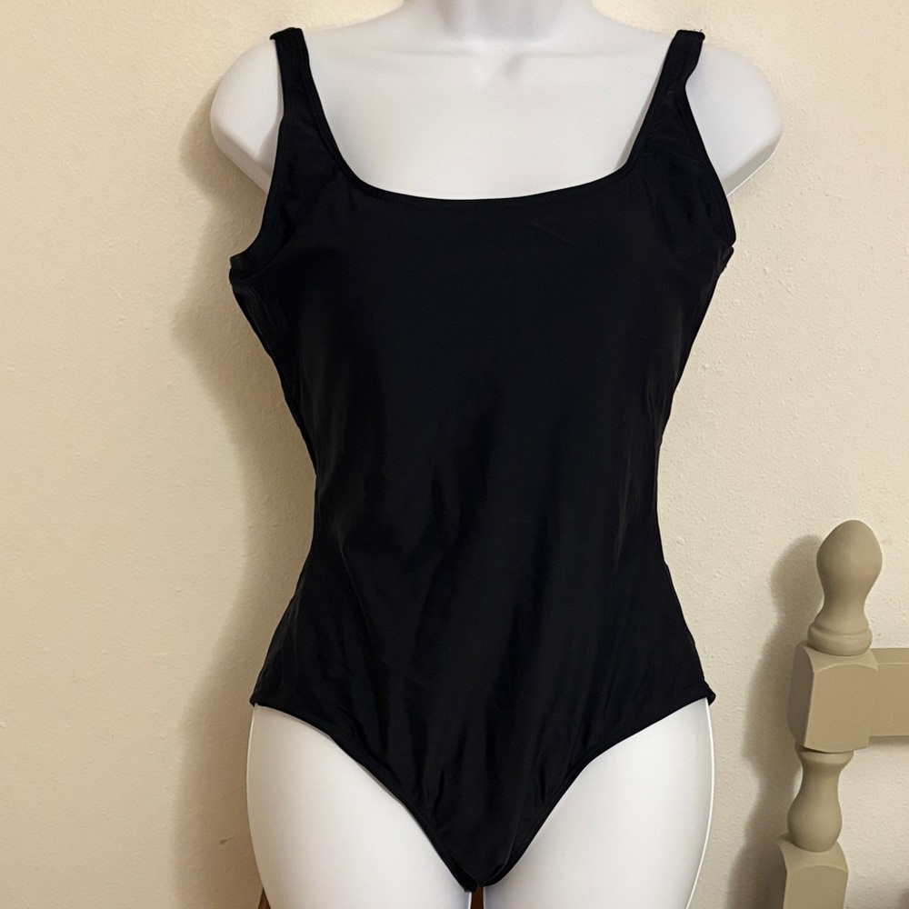 Black One-Piece Swimsuit very striking.